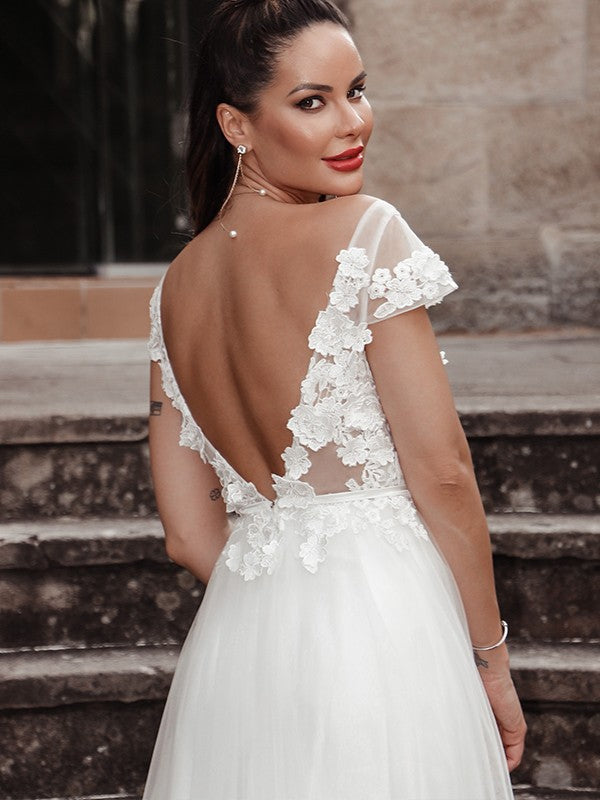 Wholesale A-Line/Princess Sleeveless Applique V-neck Tulle Sweep/Brush Train Wedding Dresses